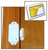 Door sensor hardware, installed, with inset photo of remote wireless alarm unit.