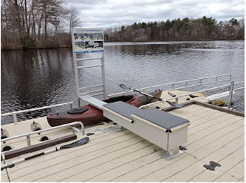 EZ dock launch system in Norwell. Shows kayak positioned under the transfer bench. 