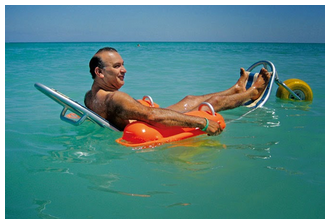 Man floating in ocean in a Mobi chair. 